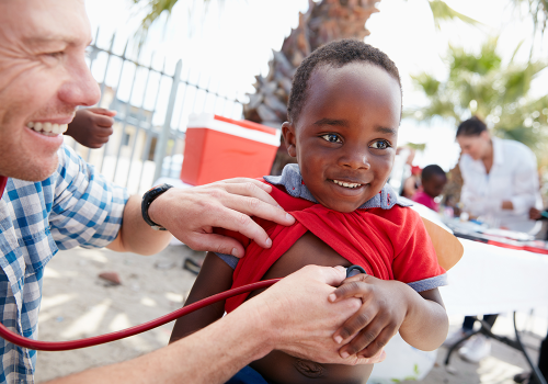 shot-of-a-volunteer-doctor-giving-checkups